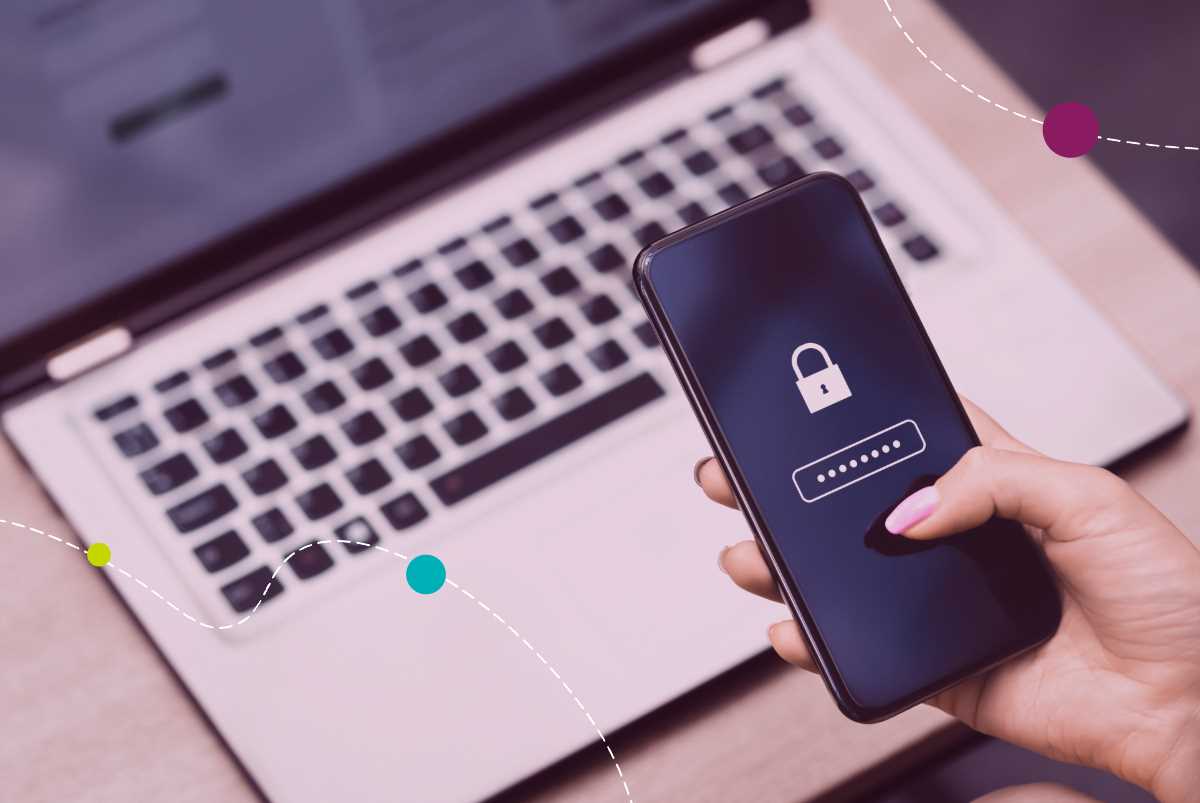 Person logging in on phone and computer