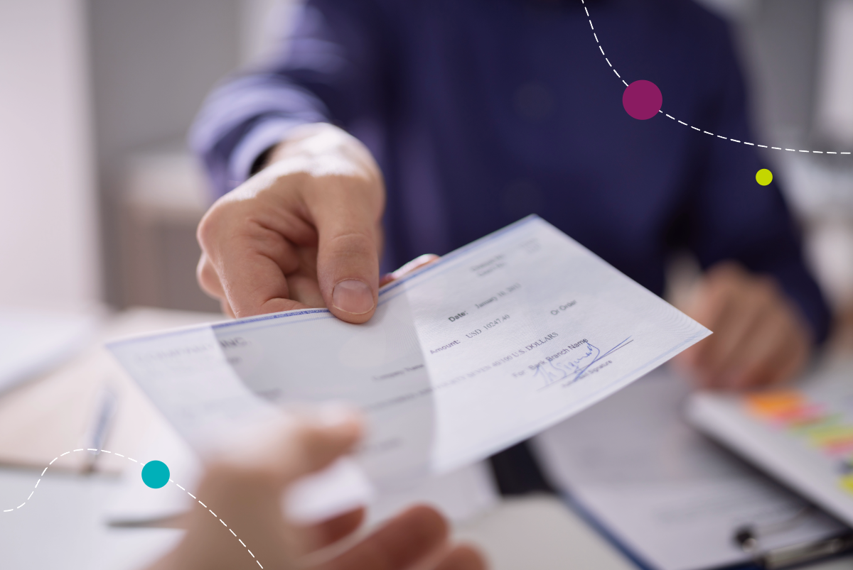 Person handing over a cashier's check