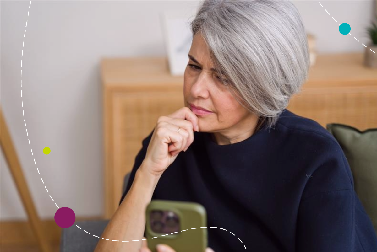 woman looking skeptical at phone fraud