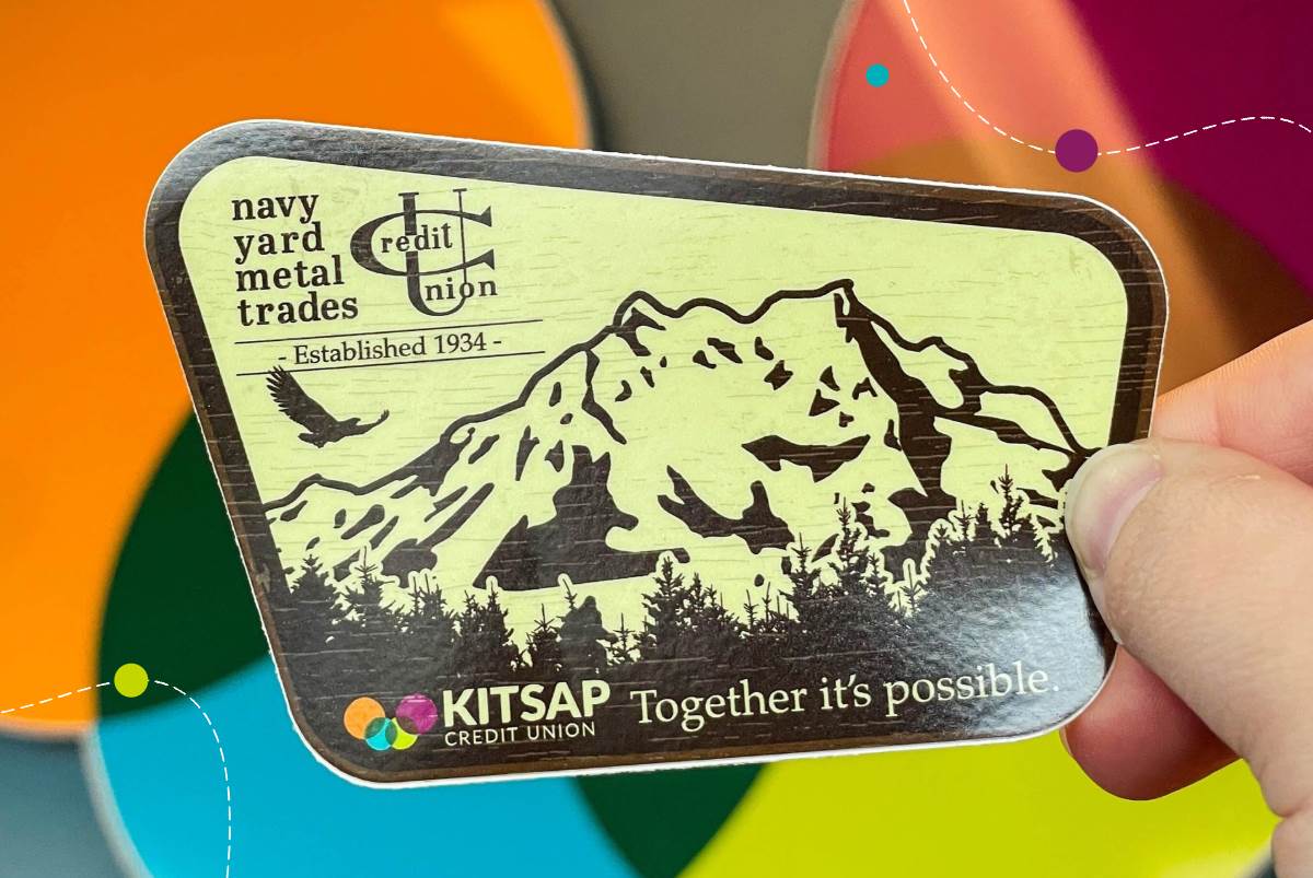 Sticker with mountain and KCU logo.